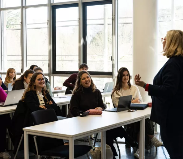 Professor talking to a group of students